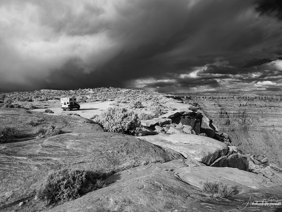 Storm Clouds above a camper parked at Muley Point, Utah, shot in infrared